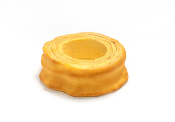 Isolated baumkuchen, Sakotis ,sekacz pie, traditional spit egg cake on white background. Copy space, horizontal plane