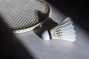 Badminton racket and shuttlecock on grey background. Horizontal sport theme poster, greeting cards, headers, website and app