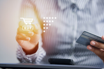 customer, buyer, Buyer using a laptop to enter the order paying with credit cards for online purchases. e-commerce technology concept. Rating online purchases