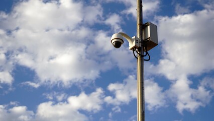 360 security camera against the sky