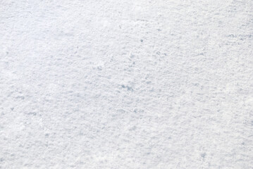 Fresh white snow on the ground background
