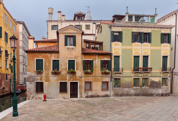 Old beautiful houses in a traditional small square in Venice.