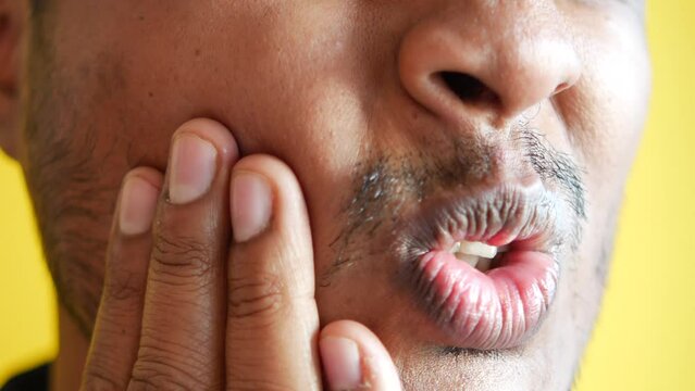 young man with sensitive teeth 