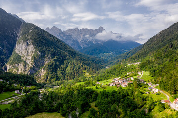 Naklejka na ściany i meble an aerial view of the village of Golsado in the Bellunesi Dolomites region