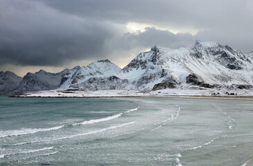 Winter stormy landscape of Skagsanden beach, Flakstad, Lofoten islands, Norway, Europe