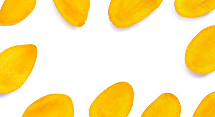 Frame made of mango slices on white background. Top view