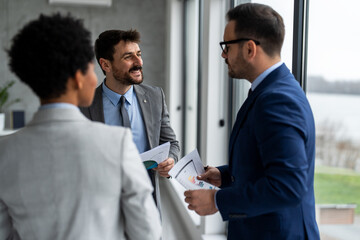 Multiracial business team having meeting in modern office