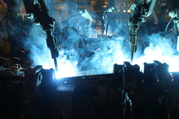 The robot welding in an auto parts factory.
