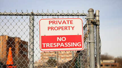 No Trespass sign in front of private property depicting security, privacy, and protection 