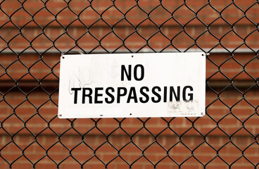 No Trespass sign in front of private property depicting security, privacy, and protection 