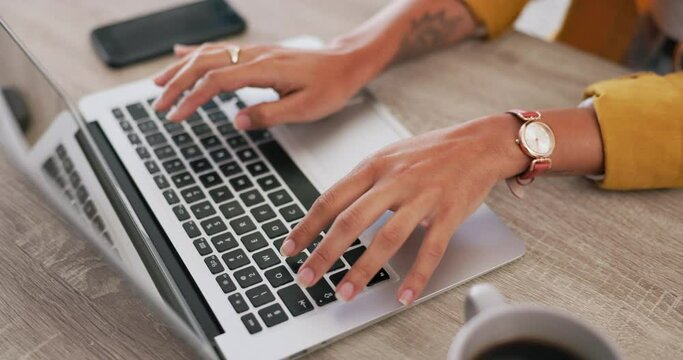 Woman, hands and typing on laptop for research, planning or communication on the office desk. Hand of female working on computer keyboard for email, social media or business and project plan schedule