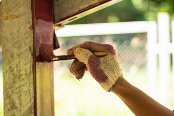 Rust-proof painted steel pipes in the factory. Red iron pipe. Rust-proof paint, water pipes