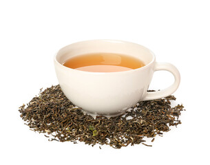 Cup of hot green tea and dry leaves on white background
