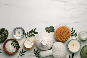 Flat lay composition with different spa products on white marble table. Space for text