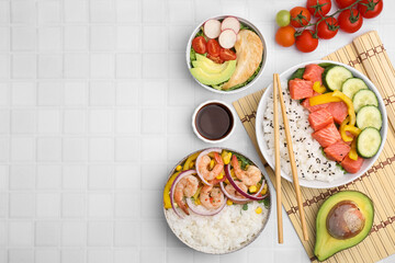 Set of delicious poke bowls with different ingredients on white table, flat lay. Space for text
