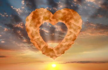 Picturesque sunset with heart formed from clouds in sky - obrazy, fototapety, plakaty