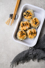 Dimsum Mentai or steamed dumpling dimsum in ceramic plate