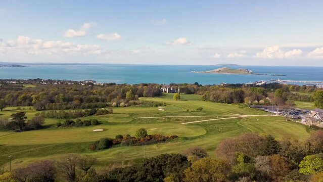 A drone shot from the disused quarry on Howth Hill  Deer Park looking east towards Ireland's Eye and Lambay Island with Howth Castle in the middle distance