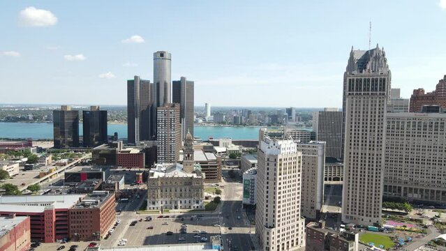 GMRENCEN Building In Downtown Detroit In Michigan. Detroit River And Windsor, Canada In Background. aerial ascend