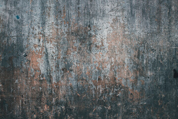 Rustic weathered cracked ik painted concrete wall macro