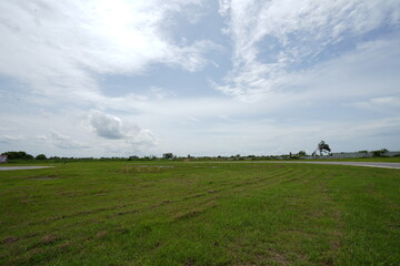 field on blue sky in thailand 
