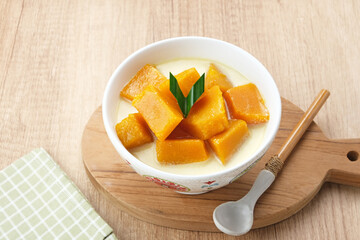 Kolak Waluh or Kolak Labu Kuning, Indonesian traditional food. Pumpkin in sweet coconut milk. Popular during ramadan
