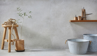 retro style, Basket, olive tree, earthen pot, stool and various objects on vintage gray concrete background