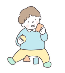 積み木で遊ぶ男の子