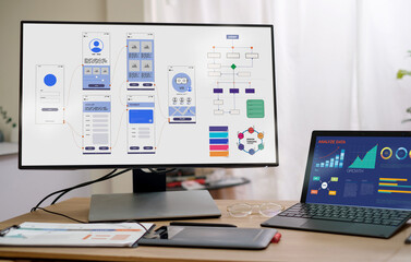 ux ui design on desktop and laptop computer screen working at home.mobile app interface design - 578917773
