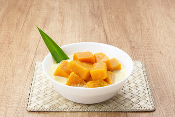 Kolak Waluh or Kolak Labu Kuning, Indonesian traditional food. Pumpkin in sweet coconut milk. Popular during ramadan
