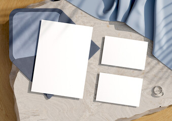 Fototapeta premium Mockup of a blank white card invitation View from above with a marble background. with clipping paths. 3d rendering