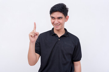 A cunning man explaining his devious plan. Gesturing with his index finger, pointing upwards. Isolated on a white background.