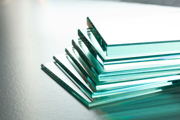 Clear glass from factories of various sizes arranged in multiple sheets	