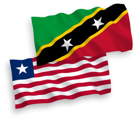 Flags of Federation of Saint Christopher and Nevis and Liberia on a white background