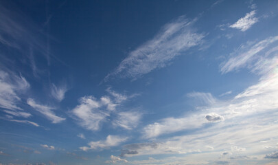 Naklejka na ściany i meble Navy sky with white clouds, nature background