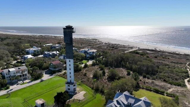 sullivan's island lighthouse aerial push in to ocean near charleston sc, south carolina