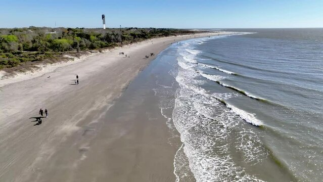 sullivan's island beach aerial with lighthouse in background near charleston sc, south carolina