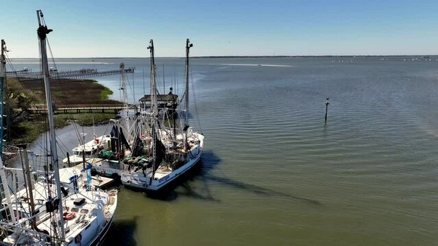 aerial push by shrimp trawlers along shem creek near charleston sc, south carolina
