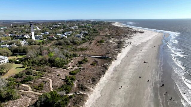 sullivan's island lighthouse aerial pullout over beach near charleston sc, south carolina