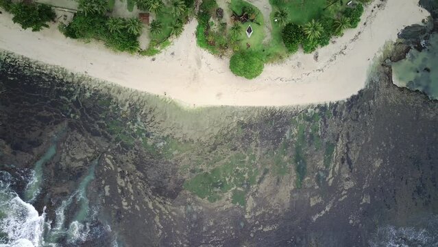The beauty of the beach with coral reefs and white sand captured using a drone from Krapyak Beach, Indonesia.
4K resolution drone footage.