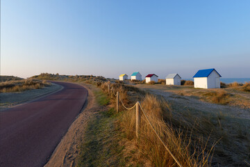 Colored cabins in Gouville-sur-Mer village. Cotentin coast