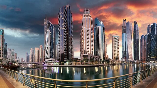 Time lapse of dramtic sunrise of the Dubai Marina in the Persian Gulf. Holidays and vacations, UAE