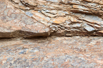 Crumbled rock surface. Texture background.
