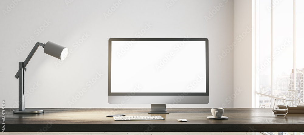 Aufkleber Blank white modern computer monitor with space for your web site or web design on wooden table with coffee cup, keyboard and lamp on light wall background in sunlit room. 3D rendering, mock up