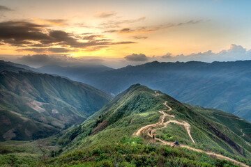 Obraz na płótnie Canvas majestic scenery of Ta Xua mountain. Travelers experience on the trail of dinosaurs spine and the top of the mountains Ta Xua. This is a very popular tourist destination in Son La province, Vietnam