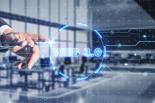 Web 3.0 new internet future distributed block chain technology concept. Close up of businessman hand pointing at hologram on blurry office interior background. Double exposure.