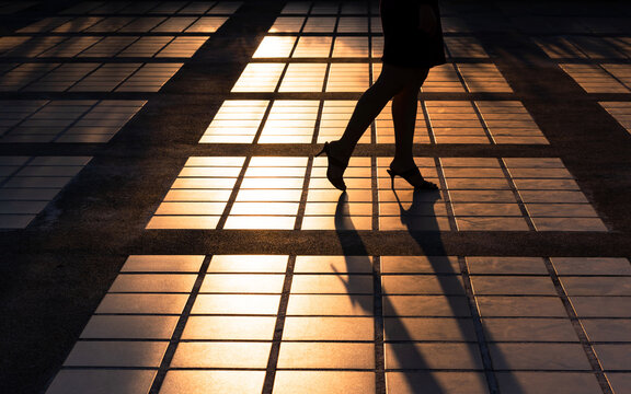 Silhouette of legs and high heels