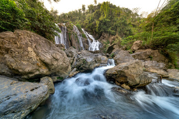 Fototapeta na wymiar The beauty of Go Lao waterfall in Mai Chau district, Hoa Binh province, Vietnam
