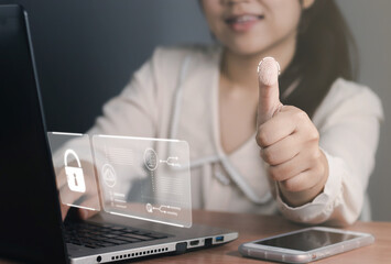 Businesswoman using phone with a biometric identification fingerprint to access personal financial data, biometrics security, surveillance and security scanning of digital programs cyber futuristic. 
