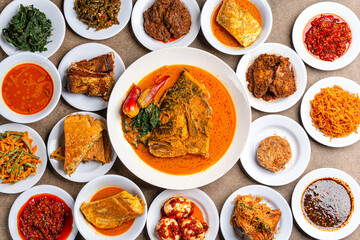 Nasi padang is a complete buffet dish like (indonesian : ayam goreng, ayam rendang, ikan gulai, perkedel, rendang sapi, telur dadar), vegetables and spicy foods eaten with white rice.